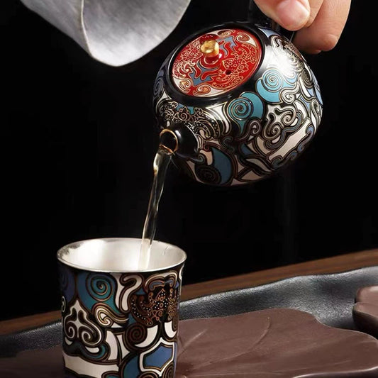 Single Kung Fu ceramic tea set with the technique of inlaying gold and silver and the pattern of Taotie